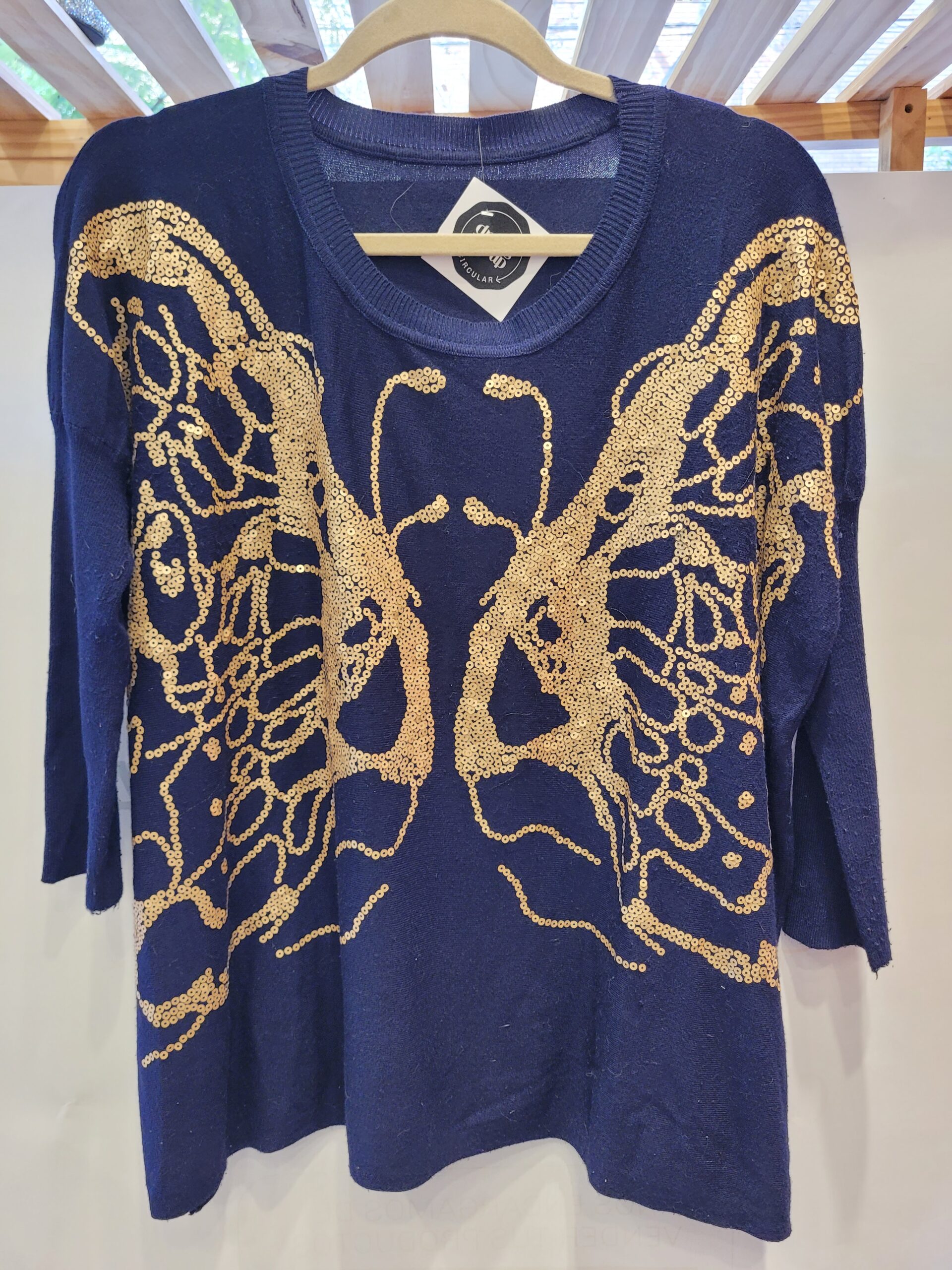 SWEATER AZUL BORDADO EN LENTEJUELAS